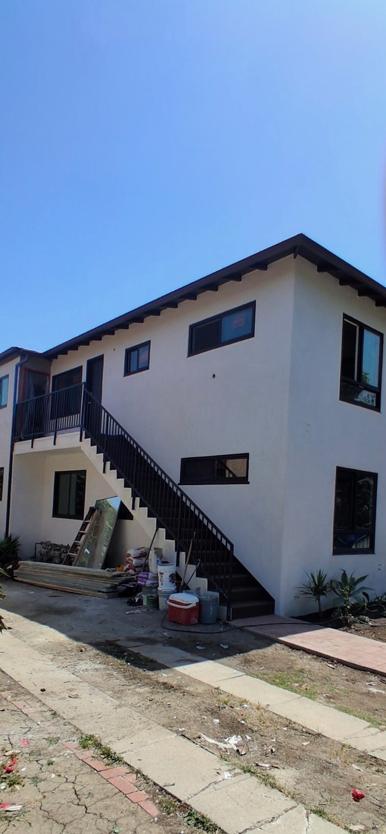 Custom black steel exterior staircase and railing by Final Iron in Los Angeles