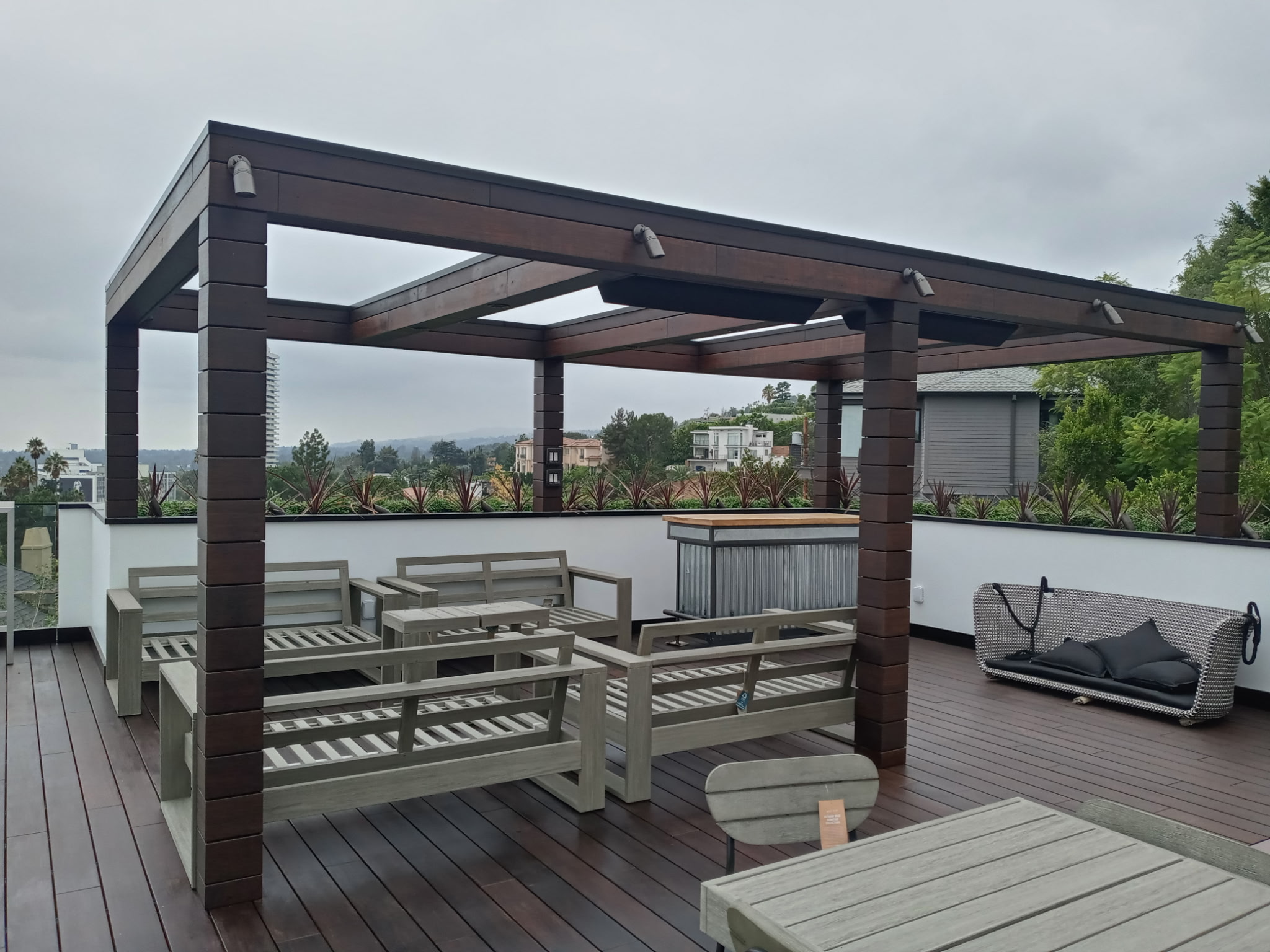Custom wood and steel rooftop pergola structure in Los Angeles